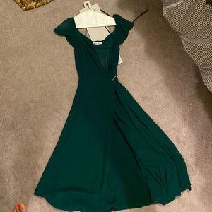 Reformation piper dress in emerald green. Worn twice